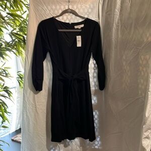 New with tags loft, size 6 ladies faux wrap, black dress. Classic!